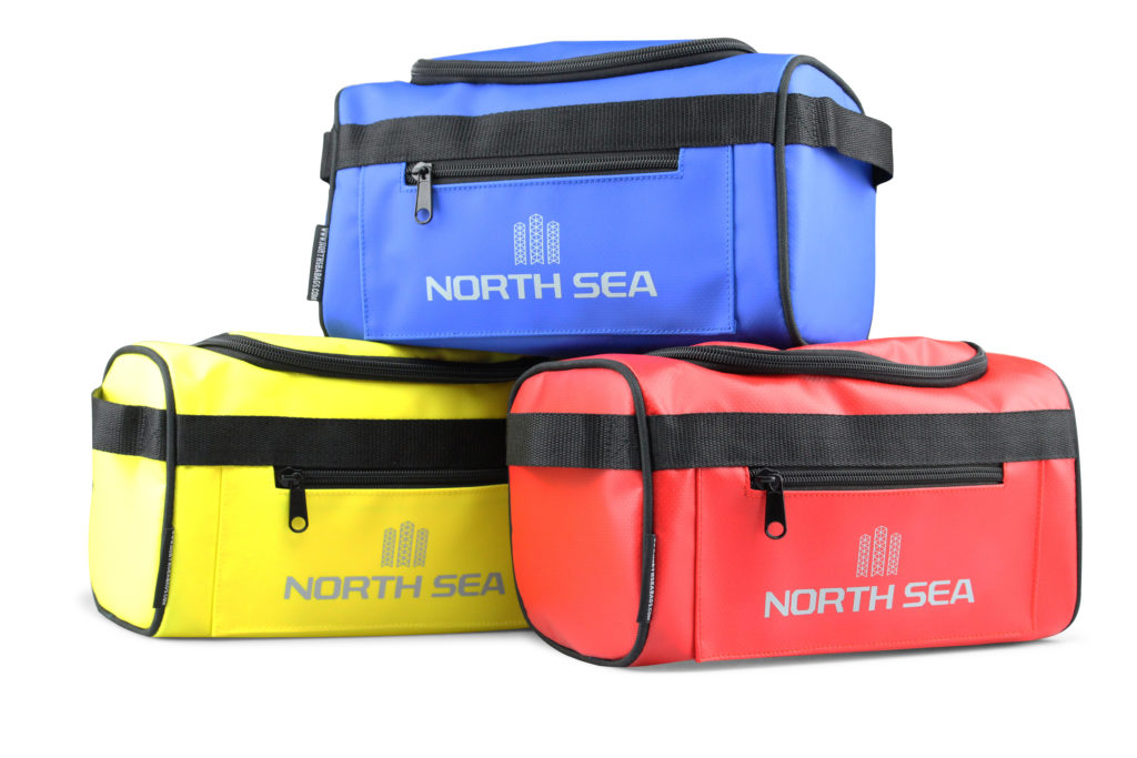Three North Sea wash bags in red, yellow and blue