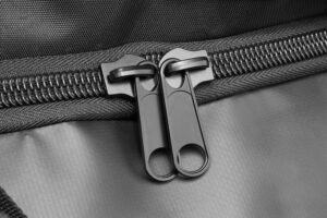 Metallic zippers on a offshore duffelbag