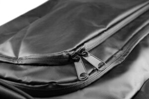 Top pockets of a tarpaulin offshore grab bag. metallic zippers