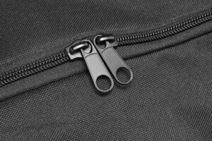 Black metal zippers from an offshore nylon grab. bag